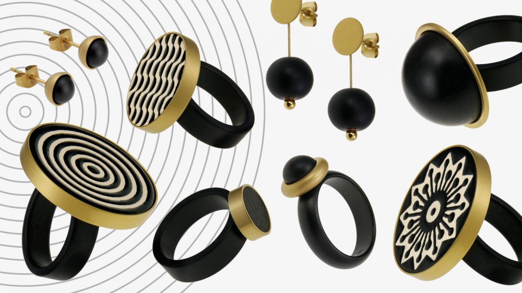 Bild von schwarz und goldenem Schmuck von hk schmuck